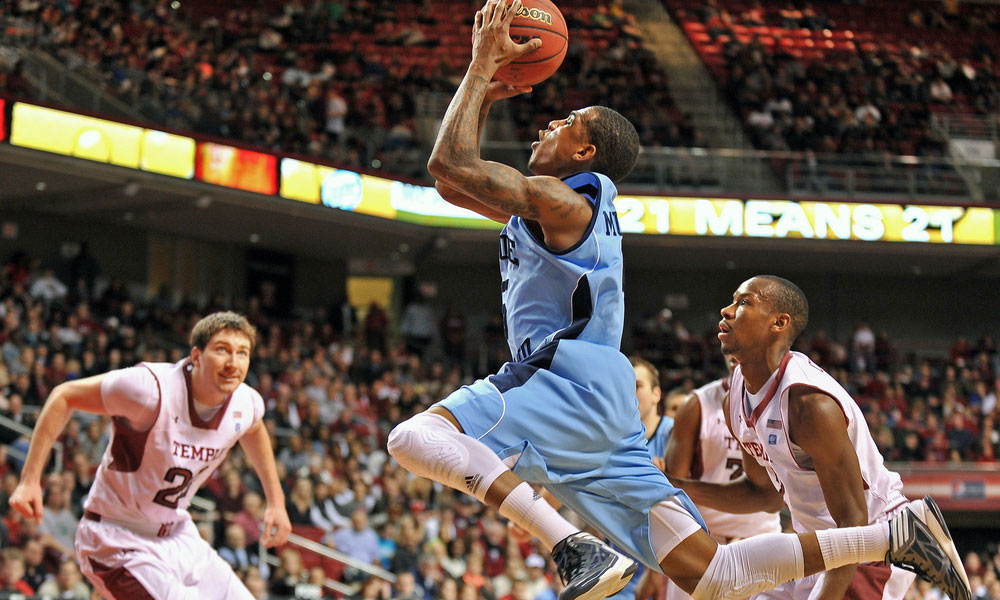 Rhode Island Rams guard Xavier Munford takes a shot during a basketball game against Temple on March 2, 2013 in Philadelphia.