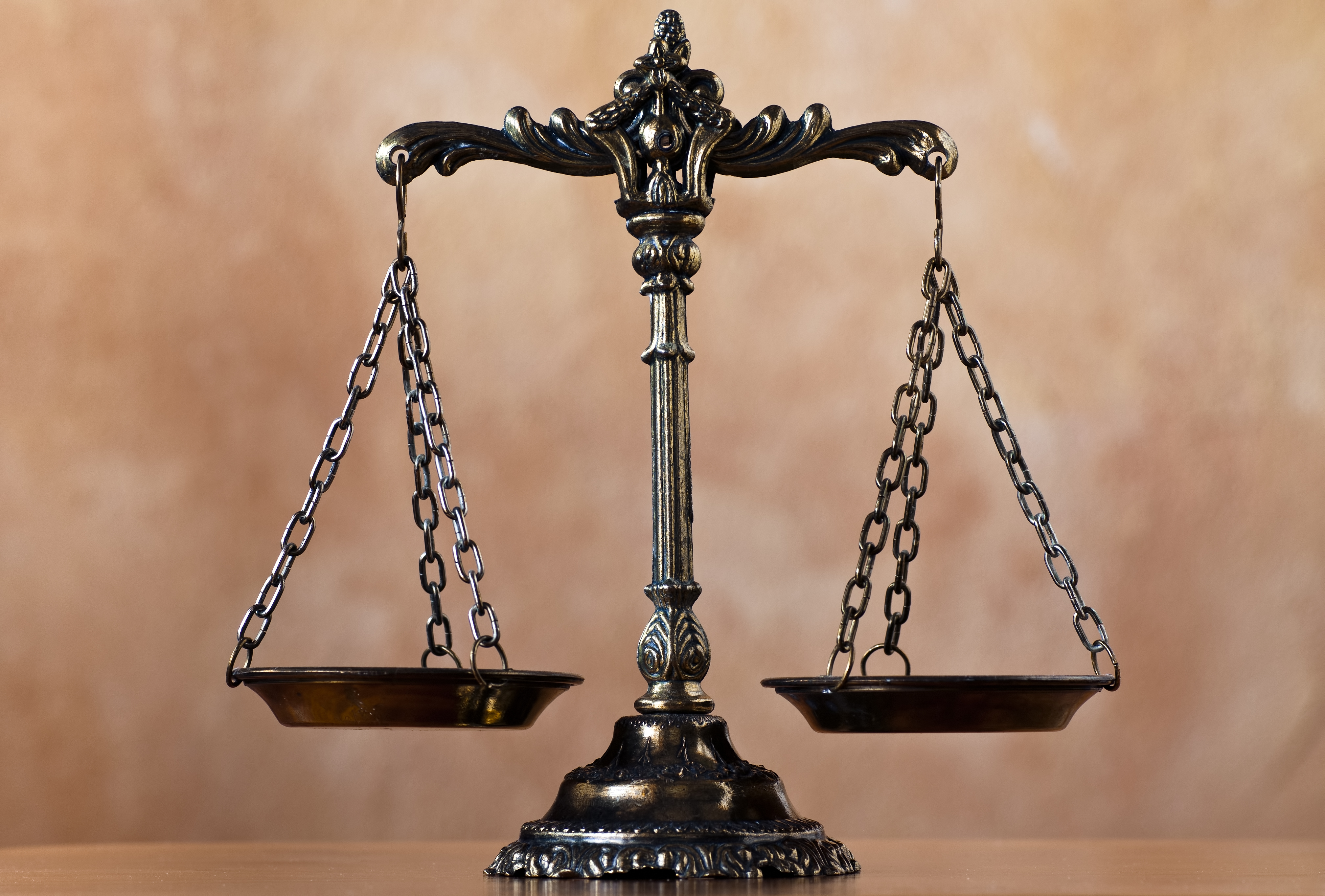 Scales of justice. Shutterstock/MilousSK