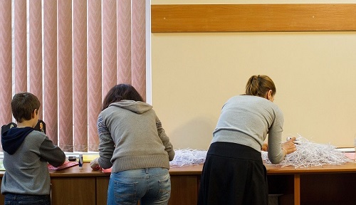 Volunteers restore shredded documents in Ukraine